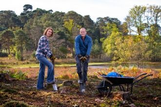 volunteers creating bare ground for improvements to habitat