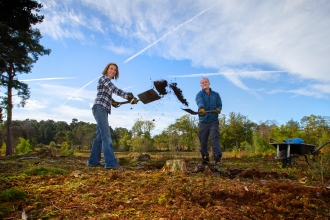 volunteers creating bare ground for improvements to habitat