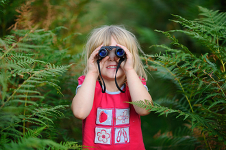 Girl with binoculars