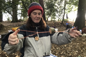 Forest School spinning in the forest