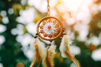 Dream catcher hanging from a tree