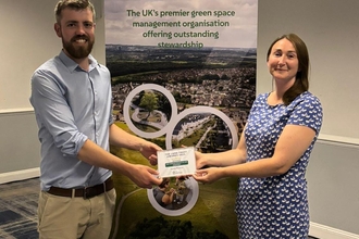 Claire and Henry receiving the Land Trust Award