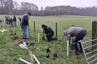 Volunteers hedge planting at Gate Street Farm