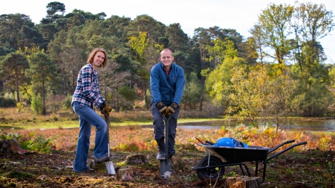 volunteers creating bare ground for improvements to habitat