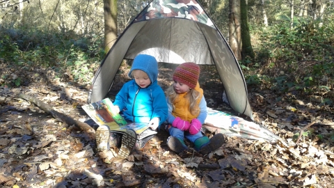 Wild Tots reading in tent