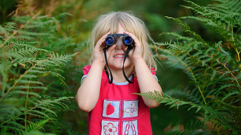 Girl with binoculars