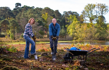 volunteers creating bare ground for improvements to habitat
