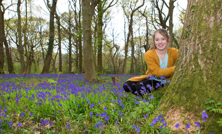 Girl amongst bluebells