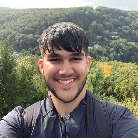 Young man taking a selfie in the countryside