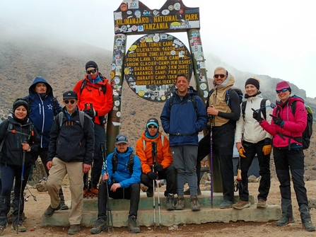 Kia employees at the summit of Mt Kilimanjaro