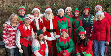 Nower Wood volunteers and staff dressed in bright, festive outfits