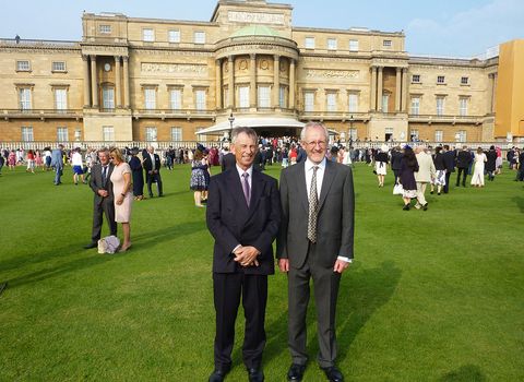 Chris Wilkinson, chair of Trustees, and Simon Humphreys, volunteer, at Buckingham Palace