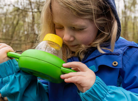 child using a minibeast viewer